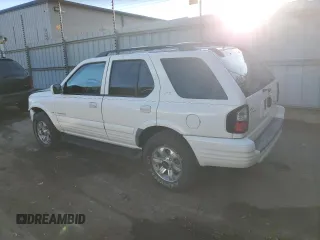 2000 Isuzu Rodeo S z VIN 4S2CK58W8Y4340907, wystawiony jako Copart lot #79683804 z przebiegiem 153 419 mil mil oraz Szkoda całkowita • Salvage title. Historia ofert i sprzedaży dostępna na DreamBid. Obrazek 2.