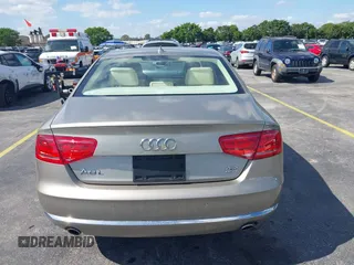 2012 Audi A8 z VIN WAURVAFD0CN001646, wystawiony jako IAAI lot #41524110 z przebiegiem 105 187 mil mil oraz . Historia ofert i sprzedaży dostępna na DreamBid. Obrazek 16.