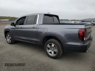 2024 Honda Ridgeline RTL with VIN 5FPYK3F54RB016029, listed as a Copart auction lot 82542864 with 6,745 mi miles and Salvage title. Bid and sale history available at DreamBid. Image 2.
