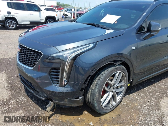 2021 Cadillac XT4 FWD Sport with VIN 1GYFZER41MF079193, listed as a IAAI auction lot 42331594 with 72,287 mi miles and . Bid and sale history available at DreamBid. Image 6.