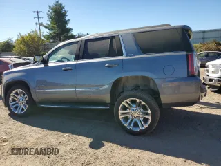 2019 GMC Yukon SLT with VIN 1GKS2BKC8KR103093, listed as a Copart auction lot 74321584 with 35,927 mi miles and Clean Title. Bid and sale history available at carsss.com. Image 2.