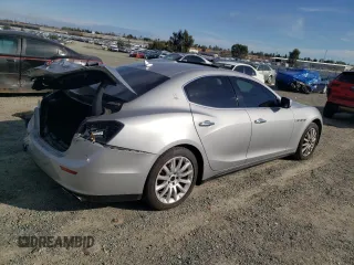 2014 Maserati Ghibli z VIN ZAM57XSA3E1105712, wystawiony jako Copart lot #47751435 z przebiegiem 88 432 mil mil oraz Szkoda całkowita • Salvage title. Historia ofert i sprzedaży dostępna na DreamBid. Obrazek 3.