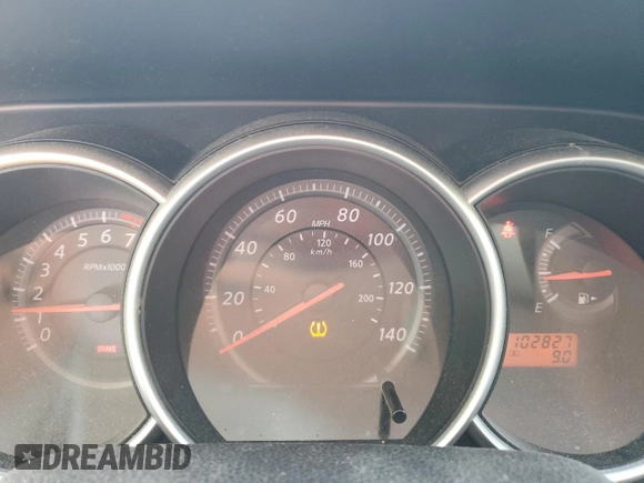 2012 Nissan Versa S with VIN 3N1BC1CP5CK220300, listed as a Copart auction lot 52963985 with 102,827 mi miles and Salvage Title. Bid and sale history available at carsss.com. Image 9.