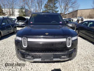 2023 Rivian R1S Adventure with VIN 7PDSGABA3PN012584, listed as a Copart auction lot 47557575 with 8,633 mi miles and Salvage Title. Bid and sale history available at carsss.com. Image 5.