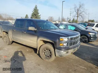 2014 Chevrolet Silverado 1500 LT with VIN 3GCUKREC5EG520698, listed as a IAAI auction lot 41802165 with 191,697 mi miles. Bid and sale history available at carsss.com. Image 1.