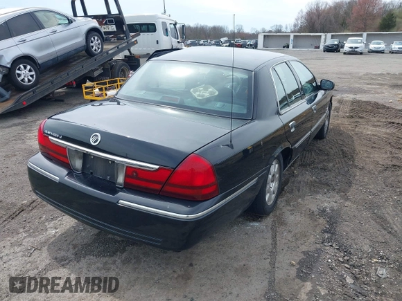 2005 Mercury Grand Marquis LS Premium z VIN 2MEFM75W65X671622, wystawiony jako IAAI lot #41958287 z przebiegiem 154 662 mil mil oraz . Historia ofert i sprzedaży dostępna na DreamBid. Obrazek 4.