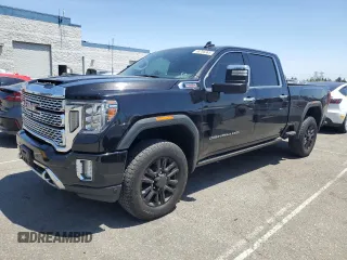 2022 GMC Sierra 2500HD Denali z VIN 1GT49REY7NF186814, wystawiony jako Copart lot #58206365 z przebiegiem 23 434 mil mil oraz Czysty tytuł • Clean title. Historia ofert i sprzedaży dostępna na DreamBid. Obrazek 1.