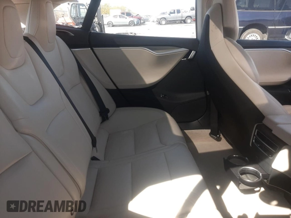 2017 Tesla Model S 100D with VIN 5YJSA1E25HF222360, listed as a Copart auction lot 56799165 with Not provided miles and Salvage title. Bid and sale history available at DreamBid. Image 11.