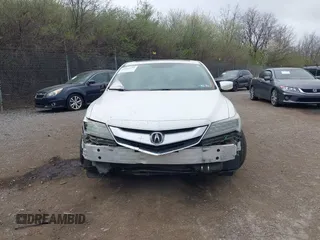 2016 Acura ILX z VIN 19UDE2F33GA013007, wystawiony jako IAAI lot #41902439 z przebiegiem 123 447 mil mil oraz . Historia ofert i sprzedaży dostępna na DreamBid. Obrazek 13.