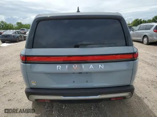 2022 Rivian R1S Launch Edition with VIN 7PDSGABL9NN002043, listed as a Copart auction lot 67654604 with 0 mi miles and Salvage Title. Bid and sale history available at carsss.com. Image 6.