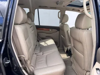 2005 Lexus GX 470 with VIN JTJBT20X050079831, listed as a Copart auction lot 56405105 with 390,415 mi miles and Clean Title. Bid and sale history available at DreamBid. Image 6.
