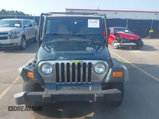 2002 Jeep Wrangler X with VIN 1J4FA39S72P733034, listed as a IAAI auction lot 42659447 with 200,786 mi miles and . Bid and sale history available at DreamBid. Image 12.