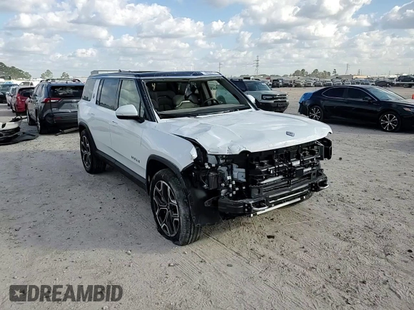 2023 Rivian R1S Adventure with VIN 7PDSGBBA3PN017791, listed as a Copart auction lot 82397374 with 20,733 mi miles and Salvage Title. Bid and sale history available at carsss.com. Image 11.