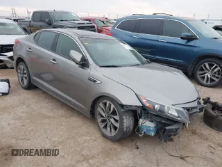 2014 Kia Optima SXL Turbo with VIN 5XXGR4A67EG336118, listed as a IAAI auction lot 41613725 with 121,671 mi miles and . Bid and sale history available at carsss.com. Image 1.