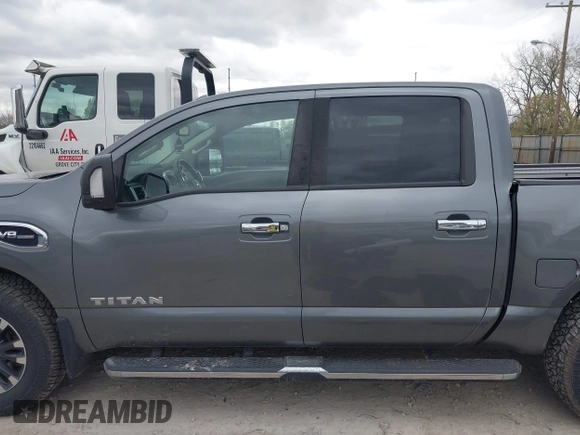 2017 Nissan Titan Platinum Reserve z VIN 1N6AA1E5XHN530256, wystawiony jako IAAI lot #42031654 z przebiegiem 97 200 mil mil oraz . Historia ofert i sprzedaży dostępna na DreamBid. Obrazek 14.