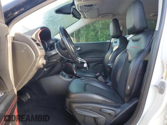 2018 Jeep Compass Trailhawk with VIN 3C4NJDDB9JT451745, listed as a Copart auction lot 61187255 with 88,923 mi miles and Salvage title. Bid and sale history available at DreamBid. Image 7.
