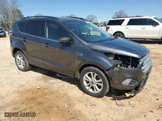 2018 Ford Escape SE with VIN 1FMCU0GD4JUD14296, listed as a Copart auction lot 50409185 with 80,700 mi miles and Salvage Title. Bid and sale history available at carsss.com. Image 4.