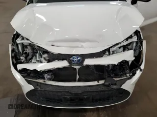 2021 Toyota Corolla Hybrid LE with VIN JTDEAMDE4MJ002382, listed as a Copart auction lot 50318865 with 74,385 mi miles and Salvage Title. Bid and sale history available at carsss.com. Image 12.