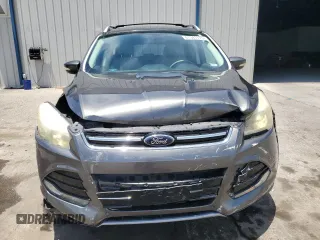 2015 Ford Escape Titanium z VIN 1FMCU0J98FUB06577, wystawiony jako Copart lot #61341175 z przebiegiem 66 206 mil mil oraz Szkoda całkowita • Salvage title. Historia ofert i sprzedaży dostępna na DreamBid. Obrazek 5.