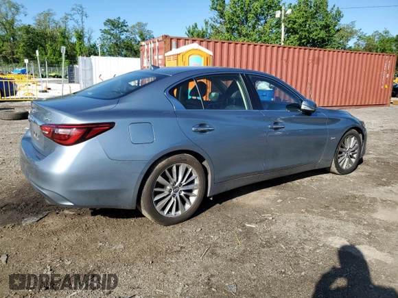 2018 Infiniti Q50 Luxe with VIN JN1EV7APXJM590569, listed as a Copart auction lot 55643215 with 86,965 mi miles and Salvage title. Bid and sale history available at DreamBid. Image 3.