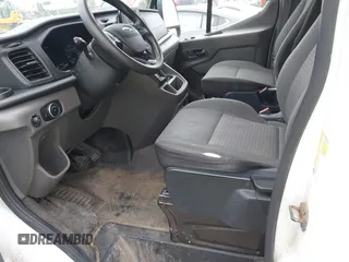 2020 Ford Transit Cargo with VIN 1FTBR3X83LKB51984, listed as a IAAI auction lot 42567147 with 209,178 mi miles and . Bid and sale history available at DreamBid. Image 14.