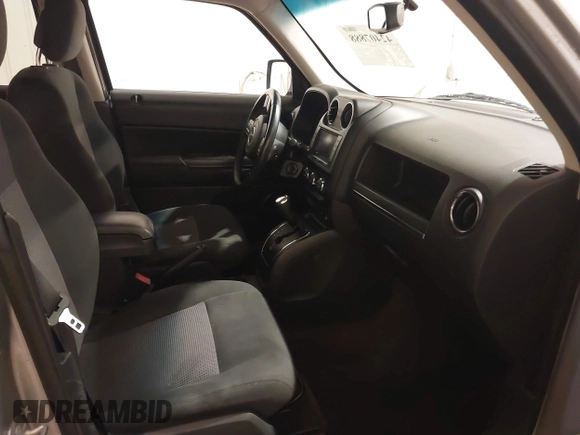 2016 Jeep Patriot Latitude with VIN 1C4NJRFB0GD581213, listed as a IAAI auction lot 42407888 with 104,202 mi miles and . Bid and sale history available at DreamBid. Image 5.
