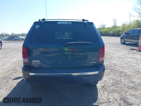 2006 Jeep Grand Cherokee Limited with VIN 1J4HR58NX6C114451, listed as a IAAI auction lot 42093832 with 264,418 mi miles. Bid and sale history available at carsss.com. Image 17.