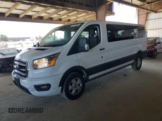 2020 Ford Transit Passenger XL with VIN 1FBAX2Y87LKA32575, listed as a Copart auction lot 61767065 with 93,125 mi miles and Salvage title. Bid and sale history available at DreamBid. Image 1.