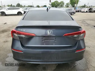 2023 Honda Civic EX z VIN 2HGFE1F72PH312995, wystawiony jako Copart lot #57284305 z przebiegiem 7 921 mil mil oraz Szkoda całkowita • Salvage title. Historia ofert i sprzedaży dostępna na DreamBid. Obrazek 6.