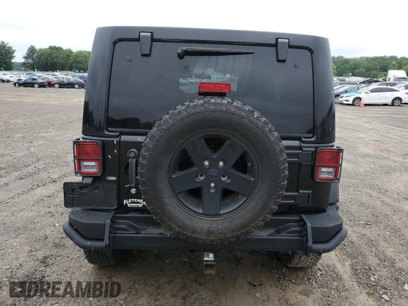 2012 Jeep Wrangler Unlimited Call of Duty MW3 with VIN 1C4BJWFG0CL218214, listed as a Copart auction lot 58432635 with 109,128 mi miles and Clean title. Bid and sale history available at DreamBid. Image 6.