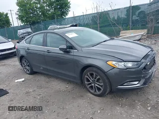 2017 Ford Fusion SE z VIN 3FA6P0HD0HR174309, wystawiony jako IAAI lot #42254232 z przebiegiem 140 999 mil mil oraz . Historia ofert i sprzedaży dostępna na DreamBid. Obrazek 1.