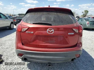 2013 Mazda CX-5 Sport with VIN JM3KE2BEXD0139032, listed as a Copart auction lot 55019325 with 108,555 mi miles and Salvage title. Bid and sale history available at DreamBid. Image 6.