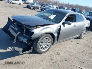 2012 Chrysler 300 with VIN 2C3CCAAG1CH138303, listed as a IAAI auction lot 41773979 with 252,550 mi miles and . Bid and sale history available at DreamBid. Image 2.