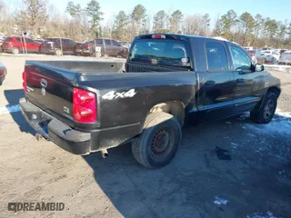 2006 Dodge Dakota SLT with VIN 1D7HW48N96S671842, listed as a IAAI auction lot 41286872 with 192,914 mi miles. Bid and sale history available at carsss.com. Image 4.
