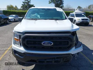 2022 Ford F-150 XL z VIN 1FTEX1CP3NKF26053, wystawiony jako IAAI lot #40372191 z przebiegiem Nie podano mil oraz . Historia ofert i sprzedaży dostępna na DreamBid. Obrazek 11.