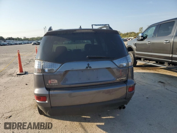 2010 Mitsubishi Outlander XLS z VIN JA4JS4AX2AZ014751, wystawiony jako Copart lot #72210974 z przebiegiem 183 864 mil mil oraz Szkoda całkowita • Salvage title. Historia ofert i sprzedaży dostępna na DreamBid. Obrazek 6.