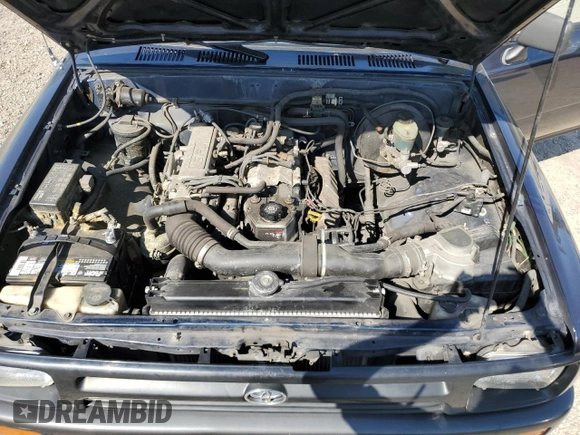 1994 Toyota Pickup with VIN 4TARN81A0RZ180129, listed as a Copart auction lot 51800195 with 153,538 mi miles and Salvage Title. Bid and sale history available at DreamBid. Image 11.