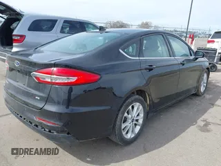 2019 Ford Fusion SE with VIN 3FA6P0H71KR255482, listed as a IAAI auction lot 41890864 with 125,077 mi miles. Bid and sale history available at carsss.com. Image 4.