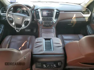2017 Chevrolet Suburban Premier with VIN 1GNSCJKCXHR348044, listed as a Copart auction lot 55957535 with 112,131 mi miles and Salvage title. Bid and sale history available at DreamBid. Image 8.