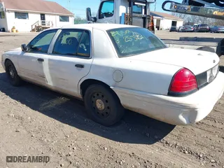 2010 Ford Crown Victoria with VIN 2FABP7AV6AX138688, listed as a IAAI auction lot 41774614 with 999,999 mi miles. Bid and sale history available at carsss.com. Image 13.