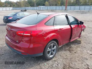 2016 Ford Focus SE with VIN 1FADP3FE6GL208688, listed as a IAAI auction lot 40980789 with 105,954 mi miles. Bid and sale history available at carsss.com. Image 4.