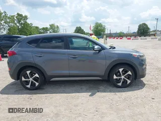 2018 Hyundai Tucson Sport z VIN KM8J3CAL9JU752050, wystawiony jako IAAI lot #42558721 z przebiegiem 173 974 mil mil oraz . Historia ofert i sprzedaży dostępna na DreamBid. Obrazek 13.