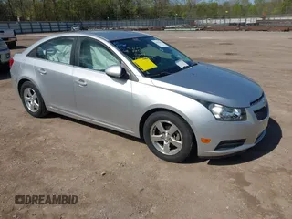 2014 Chevrolet Cruze 1LT with VIN 1G1PC5SBXE7320337, listed as a IAAI auction lot 42010404 with 69,270 mi miles and . Bid and sale history available at DreamBid. Image 1.