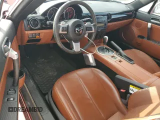 2007 Mazda MX-5 Miata Sport z VIN JM1NC25F270127574, wystawiony jako Copart lot #51538215 z przebiegiem 131 339 mil mil oraz Szkoda całkowita • Salvage title. Historia ofert i sprzedaży dostępna na DreamBid. Obrazek 8.