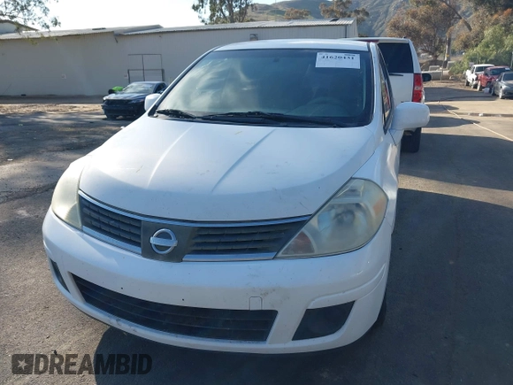 2009 Nissan Versa 1.8 SL with VIN 3N1BC13E19L389134, listed as a IAAI auction lot 41620431 with 190,884 mi miles. Bid and sale history available at carsss.com. Image 6.