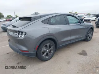 2021 Ford Mustang Mach-E Select z VIN 3FMTK1RM8MMA18120, wystawiony jako IAAI lot #42077686 z przebiegiem 71 626 mil mil oraz . Historia ofert i sprzedaży dostępna na DreamBid. Obrazek 4.