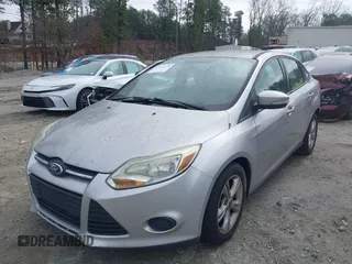 2013 Ford Focus SE with VIN 1FADP3F26DL338245, listed as a IAAI auction lot 41529378 with 176,736 mi miles and . Bid and sale history available at DreamBid. Image 2.