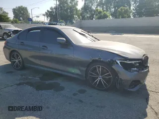 2020 BMW 3 Series 330i z VIN 3MW5R1J00L8B13518, wystawiony jako Copart lot #56289265 z przebiegiem 74 336 mil mil oraz Czysty tytuł • Clean title. Historia ofert i sprzedaży dostępna na DreamBid. Obrazek 4.