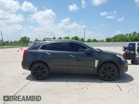 2015 Cadillac SRX Performance Collection with VIN 3GYFNCE31FS605298, listed as a IAAI auction lot 42859993 with 99,192 mi miles and . Bid and sale history available at DreamBid. Image 12.