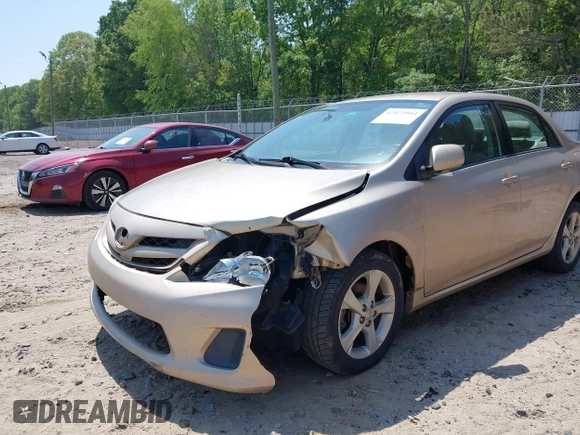 2011 Toyota Corolla L with VIN 2T1BU4EE1BC634175, listed as a IAAI auction lot 42073944 with 179,083 mi miles. Bid and sale history available at carsss.com. Image 6.